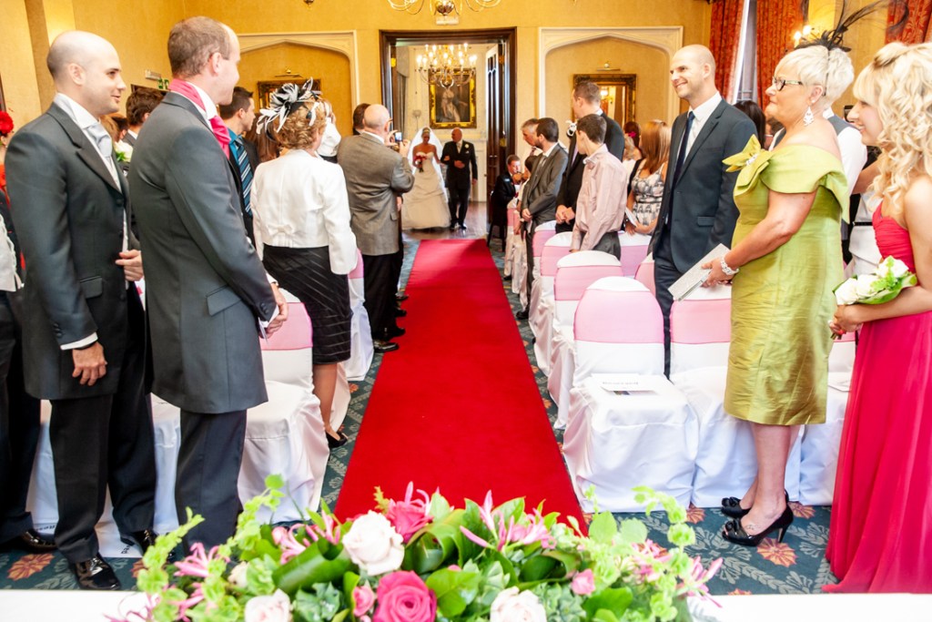 The bride enters the ceremony at Shropshire wedding venue, Rowton Castle.