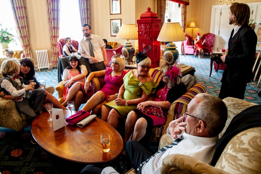 Guests sitting and chatting at Shropshire wedding venue, Rowton Castle.