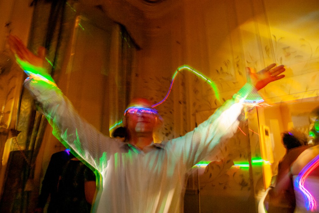A guest dancing at Shropshire wedding venue, Rowton Castle.