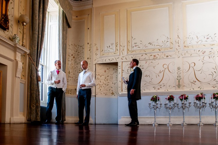 The groom and his best men chatting before a wedding at Rowton Castle in Shropshire.