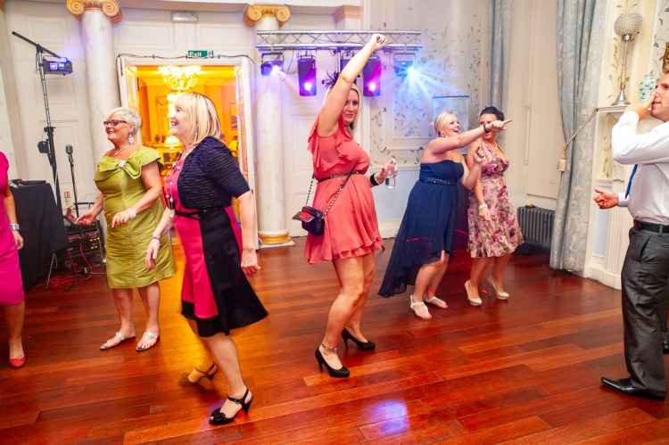 Guests dancing during a wedding at Rowton Castle in Shropshire.