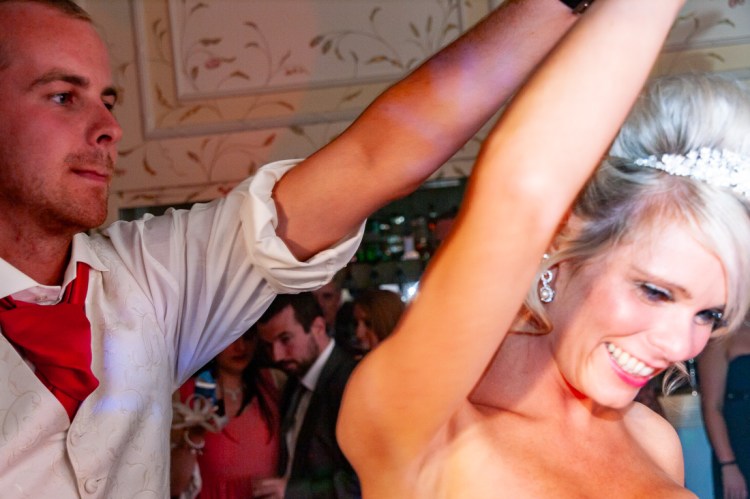 The bride and groom during their first dance, at a wedding at Rowton Castle in Shropshire.