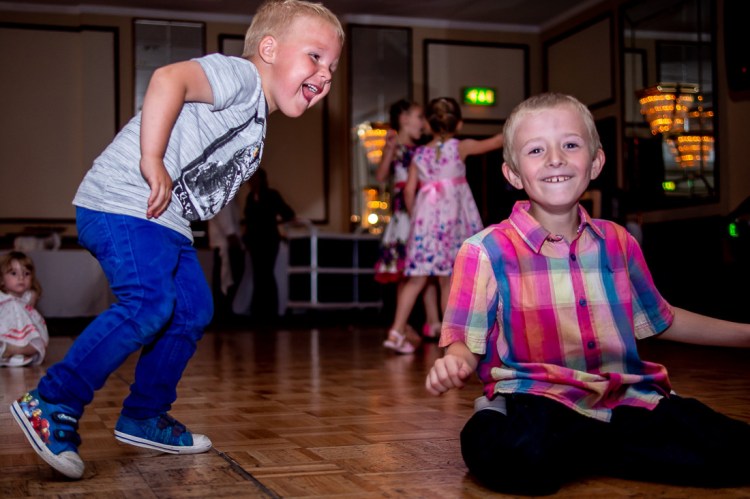 YOung guests having fun on the dancefloor, during a wedding at the Holiday Inn Seafront hotel in Brighton, East Sussex.