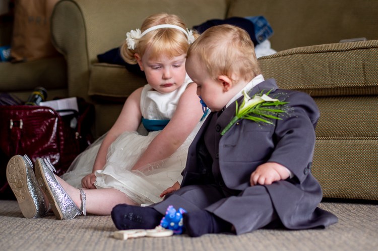 The flower girl and a young guest ahead of a wedding at the Holiday Inn Seafront hotel in Brighton, East Sussex.
