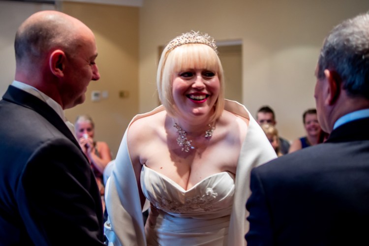 The bride and groom during a wedding ceremony at the Meon Valley Hotel, near Southampton, in Hampshire.