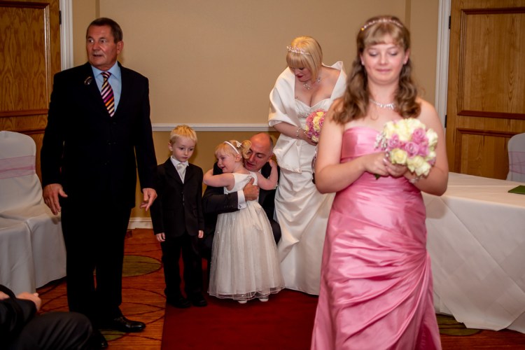 THe wedding party leave the ceremony, during a wedding at the Meon Valley Hotel, near Southampton, in Hampshire.