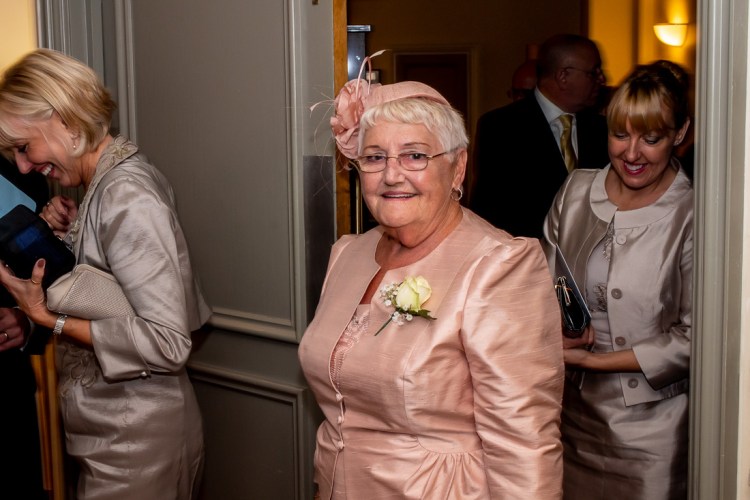 The mother-of-the-groom smiles after the ceremony, at a wedding at the Meon Valley Hotel, near Southampton, in Hampshire.
