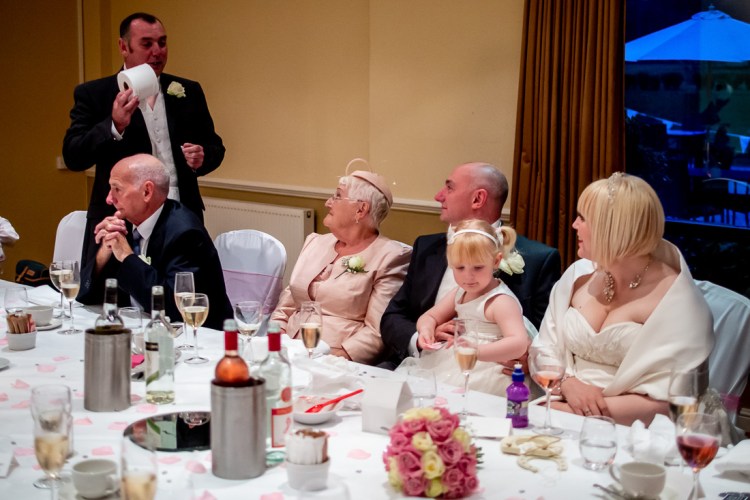 The Best Man holds up a loo roll during the speeches at a wedding at the Meon Valley Hotel, near Southampton, in Hampshire.