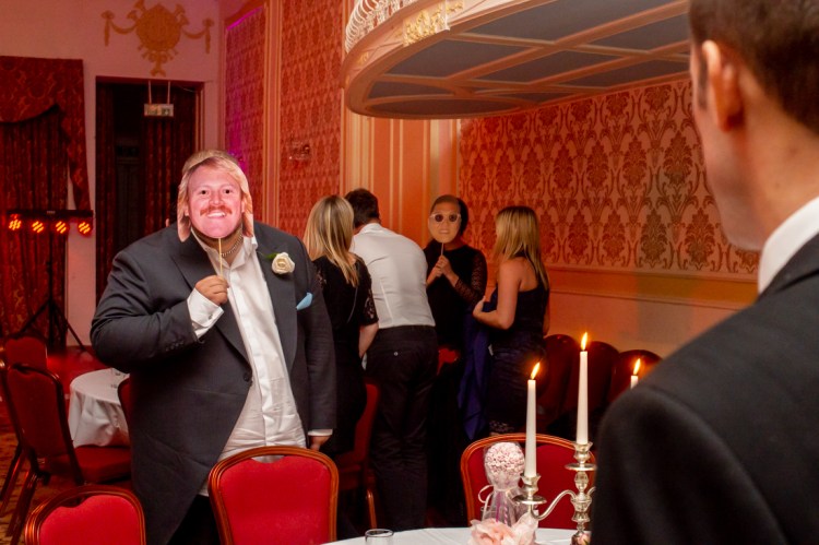 Wedding guest with a Keith Lemon mask during a wedding at the Old Ship Hotel in Brighton, East Sussex.