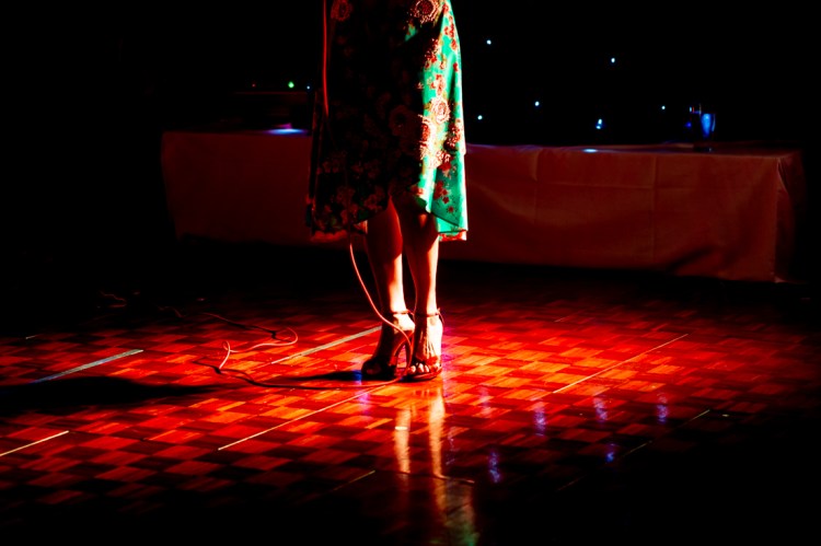 The wedding singer's shoes caught in a spotlight, during the evening wedding reception at the Old Ship Hotel in Brighton, East Sussex.