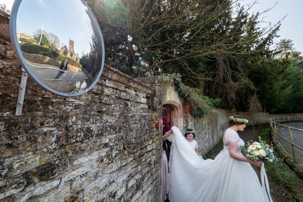 The bride heads to the wedding ceremony at Grittleton House in Wiltshire.