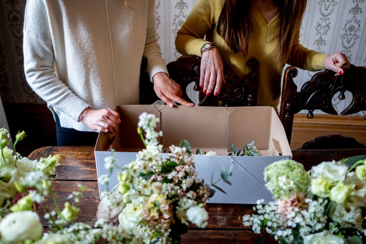 Checking the wedding flowers at Grittleton House in Wiltshire.