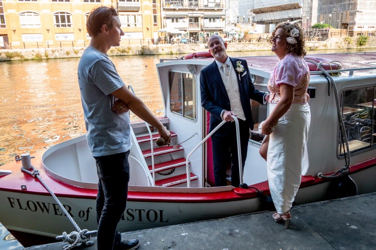 The wedding party prepare to board a Bristol Packet boat during their wedding in Bristol.