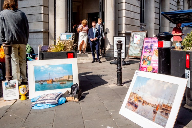 The bride and her sons makes their way to a wedding at Bristol Register Office in Bristol.