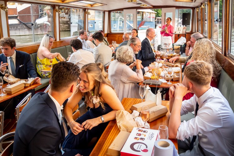 Guests enjoying the singer a Bristol wedding on the Flower of Bristol boat, run by Bristol Packet tour company.