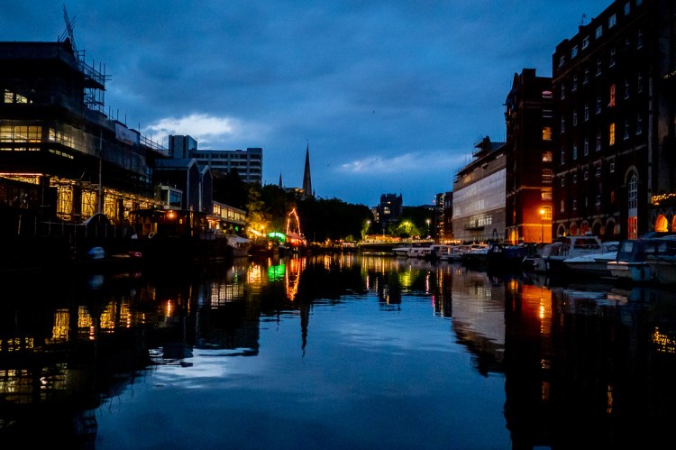 Bristol lit up at night, during a Bristol wedding on the Flower of Bristol boat, run by Bristol Packet tour company.