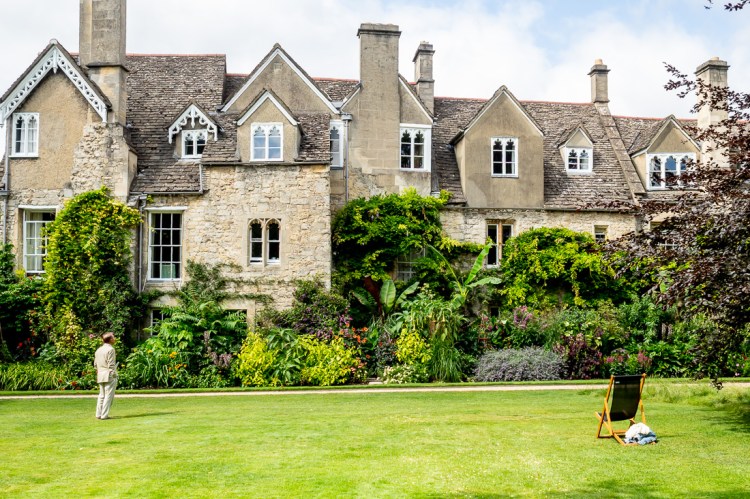 A guest enjoys the architecture at a wedding at Worcester College in Oxford.