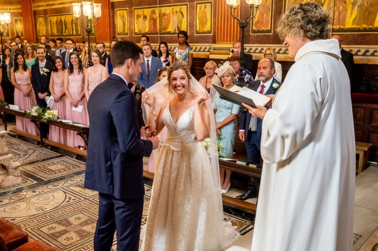 The bride and groom during the ceremony at a wedding at Worcester College in Oxford.