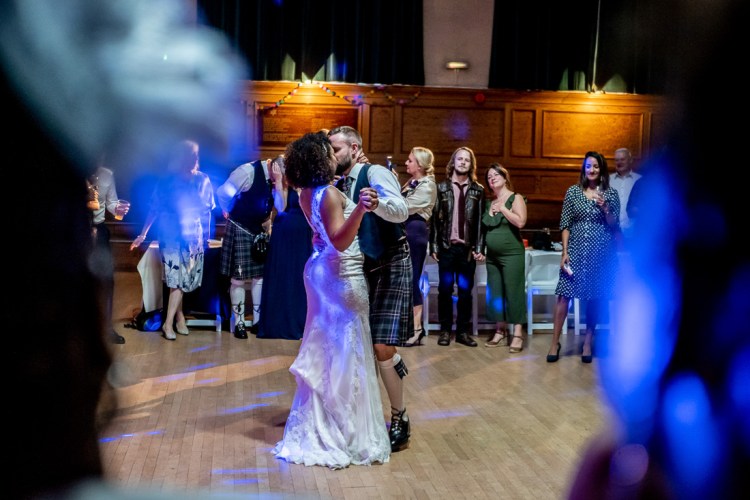 The bride and grooms first dance during a wedding at Cecil Sharp House in London.