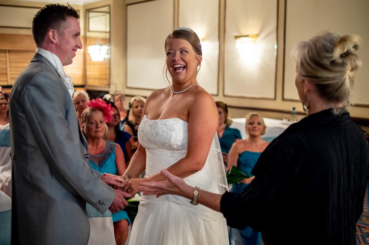 A laughing bride during a wedding at the Holiday Inn hotel in Brighton, East Sussex.